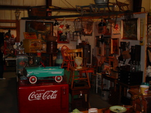 stools-chairs-old-farm-tools-sleigh-sled-advertising-garden-statues